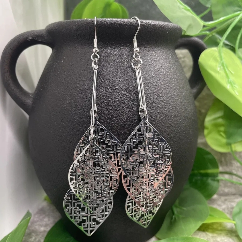 Dangling batik leaf Earrings silver color